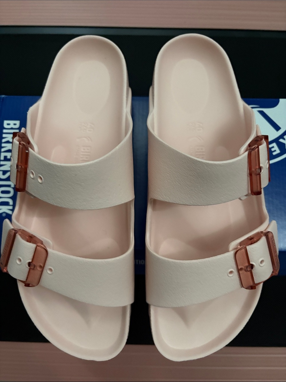 Birkenstock White & Light Pink Two-Strap Sandals with Rose Buckles